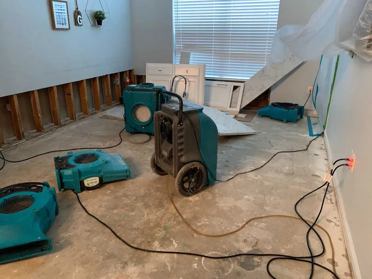 Dehumidifier in flood-cut room for Water Damage Restoration in Jan Phyl Village